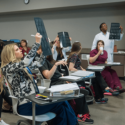 Nevada State College, Students, Cadaver Lab, x-rays, classroom, Dr. Kabret, anatomy class, hands-on learning, medical training, RN to BSN, nursing degree