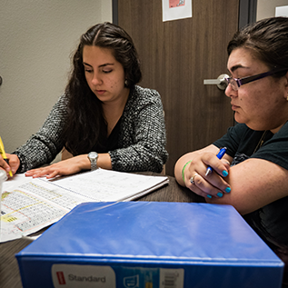 Students working together in tutoring room