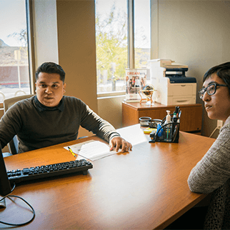 Academic advisor working with student