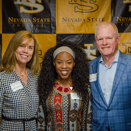 NSC Donor recipient taking photo with NSC donors, Glenn and Ande Christensen