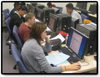 People working on computer in lab