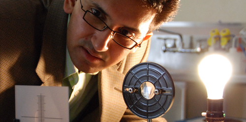 Nevada State College employee, Sandip Thanki looking at instruments