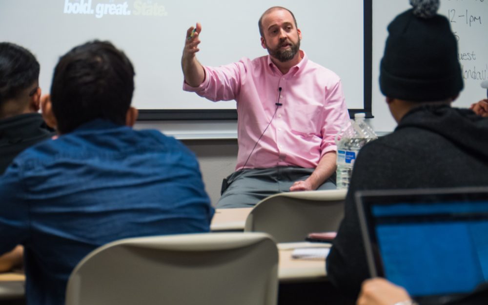 Picture of Criminal Justice Professor, Dr. Lance Hignite talking to students in classroom